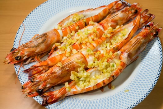 Cooked shrimp with garlic on the dish
