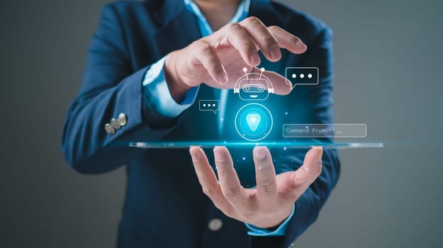 Businessman uses tablet to type chat Ask and answer with the artificial intelligence system, chatbot, AI assistant.
