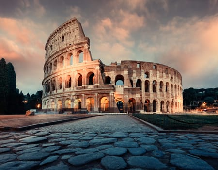 View of Colosseum in Rome and morning sun, Italy, Europe.