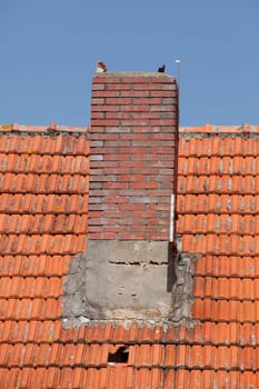 Roof, chimney, reddish bricks