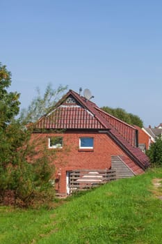 Residential house in the countryside on the dyke, Elsfleth, Wesermarsch, Lower Saxony, Germany