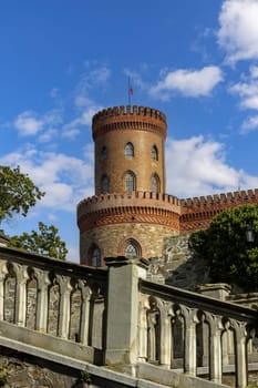 Kamieniec Zabkowicki, Poland - October 2, 2021: Kamieniec Zabkowicki Palace, 19th-century palace located in a village in the Lower Silesian Voivodeship. Fragment of the wall surrounding the building