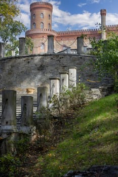 Kamieniec Zabkowicki, Poland - October 2, 2021: Kamieniec Zabkowicki Palace, 19th-century palace located in a village in the Lower Silesian Voivodeship. Fragment of the wall surrounding the building