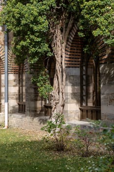Kamieniec Zabkowicki, Poland - October 2, 2021: Kamieniec Zabkowicki Palace, 19th-century monumental palace located in a village in the Lower Silesian Voivodeship. Cloistered Courtyard  with fountain