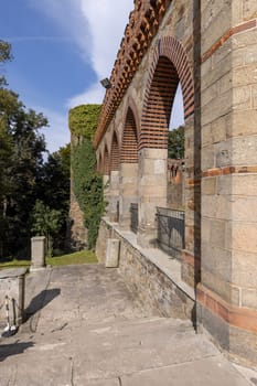 Kamieniec Zabkowicki, Poland - October 2, 2021: Kamieniec Zabkowicki Palace, 19th-century palace located in a village in the Lower Silesian Voivodeship. Fragment of the wall surrounding the building
