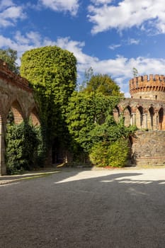 Kamieniec Zabkowicki, Poland - October 2, 2021: Kamieniec Zabkowicki Palace, 19th-century palace located in a village in the Lower Silesian Voivodeship. Fragment of the wall surrounding the building