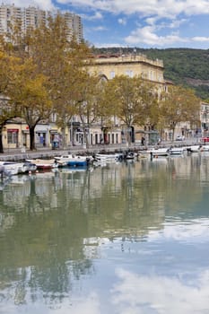 Rijeka, Croatia - September 23, 2023: View of Mrtvi Kanal, old riverbed of Rjecine. Embankment and moored boats in the marina