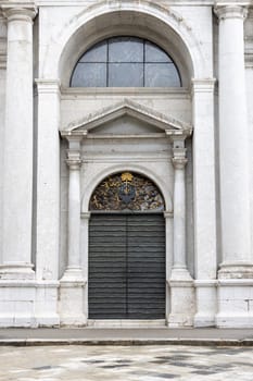 Rijeka, Croatia - September 23, 2023: Baroque St. Vitus Cathedral (Katedrala sv. Vida) also known as Rijeka Cathedral, decorative door