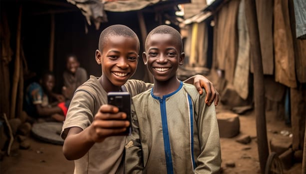 Two boys taking a selfie.African kids using mobile phones. two african boys sitting outside using smartphones to play games portrait