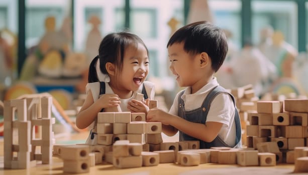 Asian kindergarten. Children boy and girl playing with constructor wooden block building, Happy little kids play wood block stacking, activities learning creative, toys for preschool and kindergarten Chinese