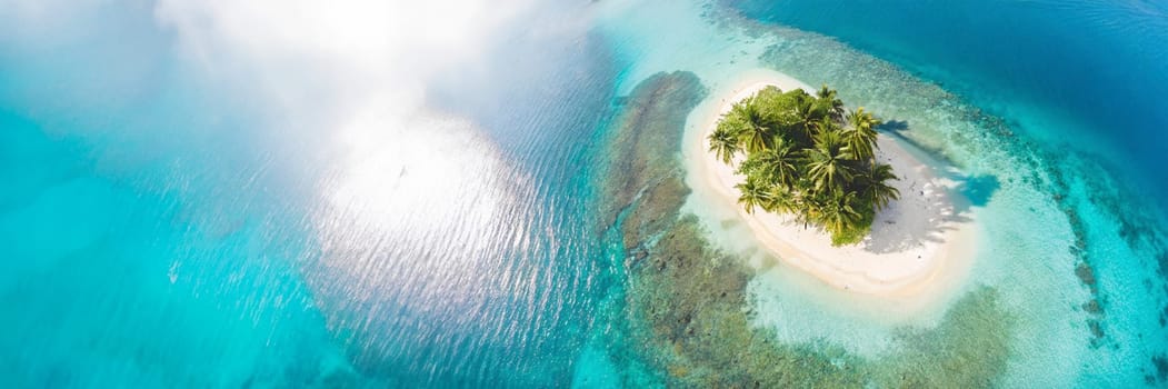 Aerial view of tropical island with palm trees and sandy beach. AI generated