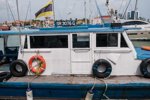 Singapore - September 4 2023: Vintage Boat Anchored in Bay