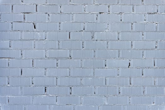 Background from a wall made of gray painted bricks