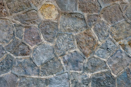 Background from an old wall made of natural stone