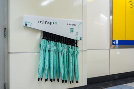 Taipei, Taiwan 26 November 2023: Shared umbrellas "Raingo"" placed outside the MRT station"