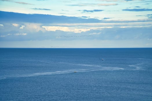 View over the Kattegat. Baltic Sea in Denmark. Blue sea with gentle waves. Landscape photo