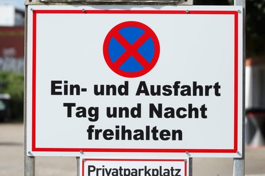 Keep entrance and exit clear day and night, Absolute stopping ban, traffic sign, Germany