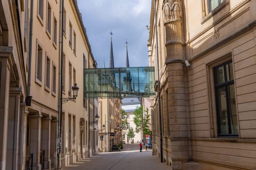 Luxembourg: August 1, 2023: View along Rue de l'Aeu towards Notre-Dame cathedral in the historic centre of Luxembourg City
