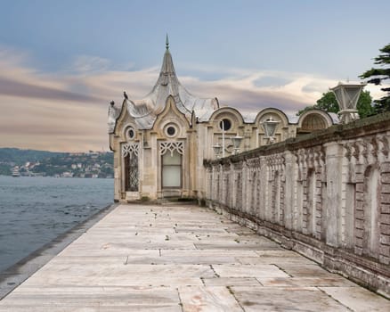 External passage by the Bosphorus strait infront of Beylerbeyi Palace leading to the charming Ottoman Sea Kiosk, aka Tent Kiosk, bathed in the golden rays of the setting sun
