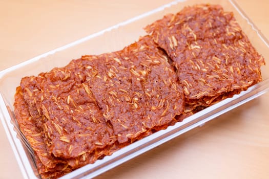 Sliced sheets of dried and crispy pork