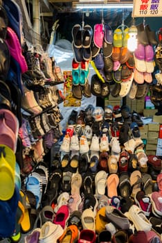 Taipei, Taiwan 18 October 2023: Shoe selling in Nanjichang street market in Taipei