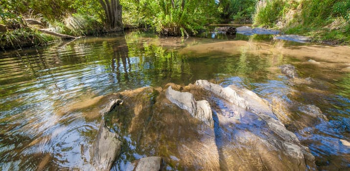 Gevora rocky riverbed, La Codosera, Badajoz, Extremadura, Spain. Idyllic location of crystal clear waters and riverside forests