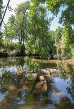 Gevora rocky riverbed, La Codosera, Badajoz, Extremadura, Spain. Idyllic location of crystal clear waters and riverside forests