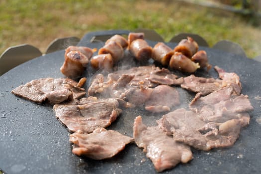 Slice of the beef grill on the metal pan