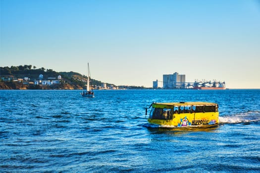 Lisbon, Portugal - August 31, 2022: HIPPOtrip amphibious sightseeing tourist bus in Tagus river