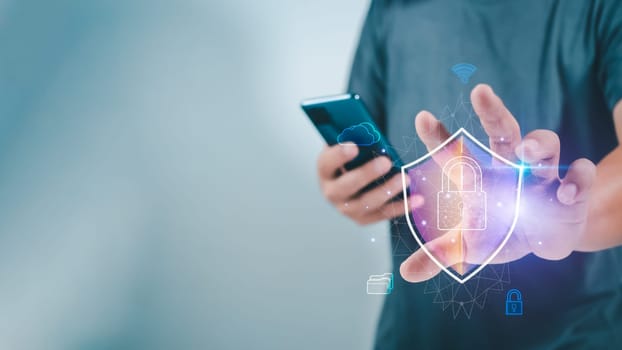 Human using smartphone secure encryption technology, cybersecurity privacy of data protection, security Internet access, security encryption of user private data, business confidentiality.