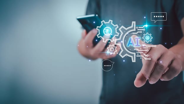 Businessman hand use show a smartphone to type live chat, ask, answer with an artificial intelligence system. chatbot. Ai assistant.