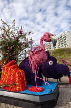 Noordwijk, Netherlands - April 22, 2023: Spectacular flower covered floats in the Bloemencorso Bollenstreek the annual spring flower parade from Noordwijk to Haarlem in the Netherlands.