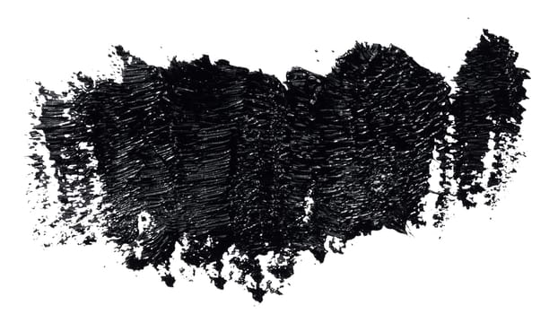 Swatch of black smudged acrylic paint isolated on white background, close up