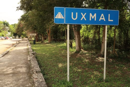 Sign saying "Uxmal"" on the parking lot of the Archaeological Site of Uxmal, close to Merida, Mexico 2022"