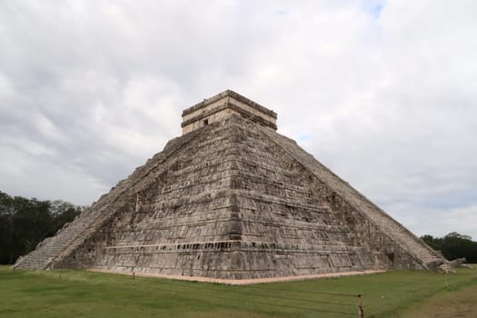 The Kukulcan Pyramid, El Castillo, The Castle at Chichen Itza, View on the intact front and its destroyed side, close to Valladolid, Mexico 2022