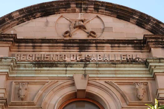 The facade of the building that now houses the botanical garden of Oaxaca, former Regimiento de Caballeria/Cavalry Regiment, Mexico 2022
