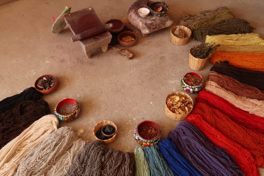 Natural ingredients that are needed to dye the threads for a traditional mexican carpet, Oaxaca, Mexico 2022