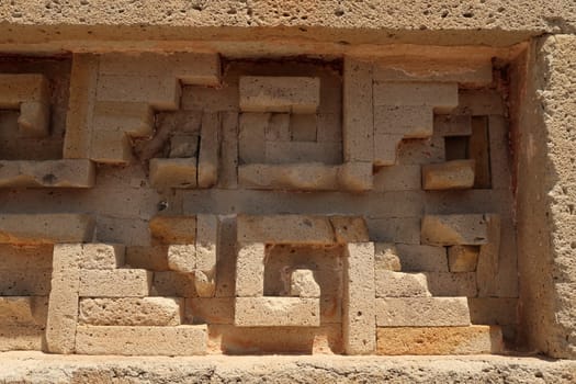 Close-up on the patterns of the facade of The Palace/Grand Hall of Columns at the archaeological site of Mitla, Oaxaca, Mexico 2022