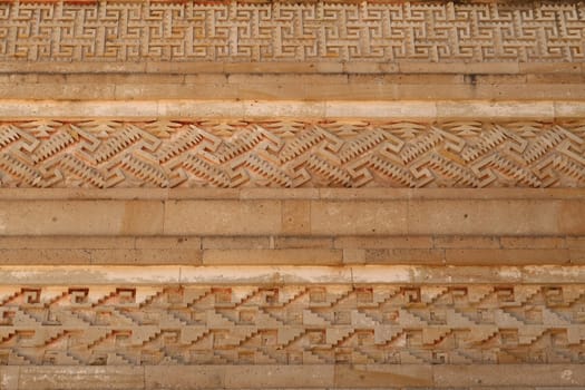 Patterns and shapes on one of the outer walls of The Palace/Grand Hall of Columns, at the archaeological site of MItla, Oaxaca, Mexico 2022