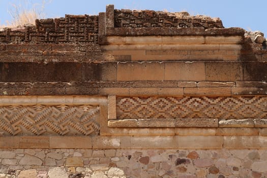 Facade of one of the temples of the Group of Columns, many different materials, layers, patterns and styles, Mitla, Mexico 2022