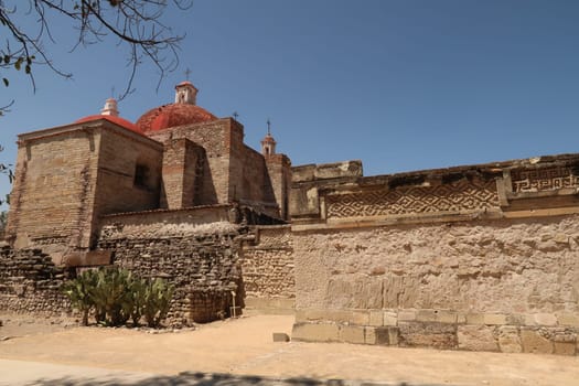 The San Pablo Villa de Mitla church next to Zapotec ruins at the archaeological site of Mitla, Oaxaca, Mexico 2022