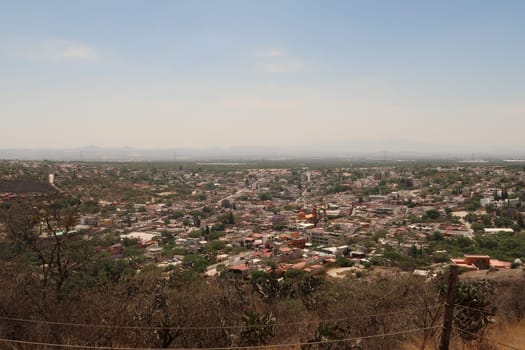 View onto the town of San Sebastian Bernal from the foot of the Pena de Bernal, Queretaro, Mexico 2022