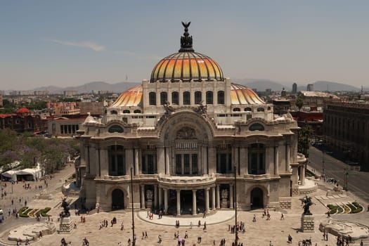 The Palacio de Bellas Artes/Palace of the Fine Arts on a sunny and busy day, Mexico City 2022