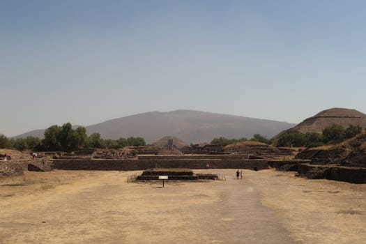 On the Avenue of the Dead/Calzada de Los Muertos seeing the Pyramid of the Sun on the right and the Pyramid of the Moon at the very end of it, Teotihuacan, Mexico City 2022