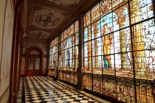 An entire hallway with stained glass windows at the Chapultepec Castle/Castillo de Chapultepec, Mexico City 2022