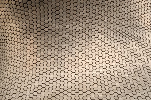 The pattern consisting of metal hexagons forming the facade of the Soumaya museum. Mexico City 2022