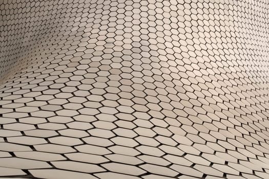Close up on the metal hexagons forming the facade of the famous Soumaya Museum, Mexico City 2022