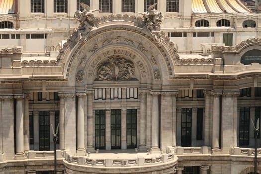View onto the balcony on the facade of the Palacio de Bellas Artes/Palace of Fine Arts with its many details, stucco and sculptures, Mexico City 2022