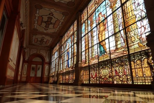 An entire hallway full of stained glass windows at the Chapultepec Castle/Castillo de Chapultepec, Mexico City 2022