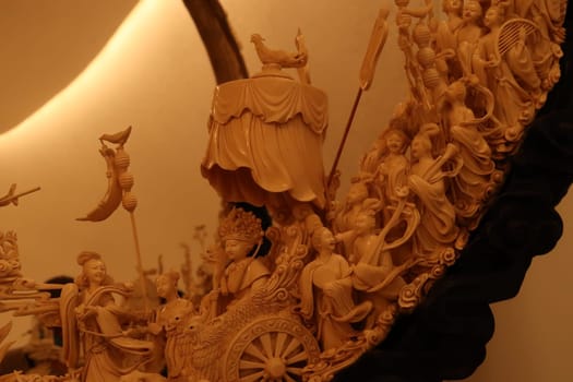 Close up look on the art piece "The Empress Mother"" carved out of the ivory of a Mammoth Tusk, displayed at the Soumaya Museum, Mexico City, 21. April 2022"